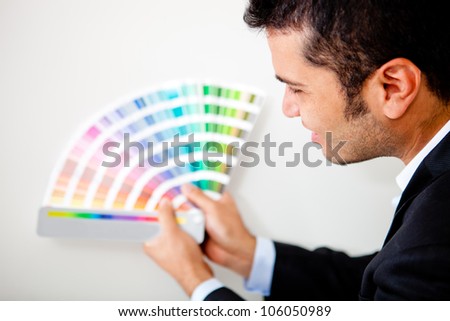 Interior designer with color palette ready to decorate