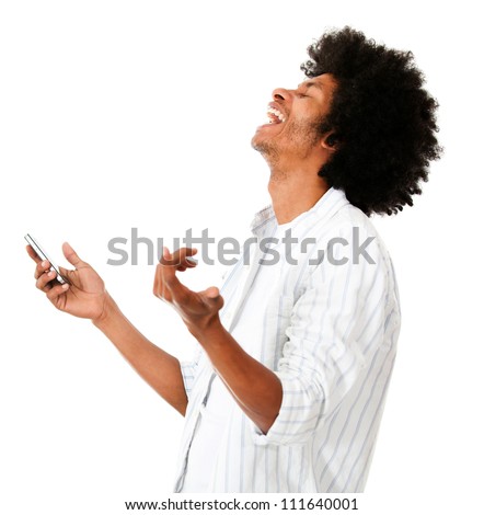 Afro man laughing holding his cell phone - isolated over a white background