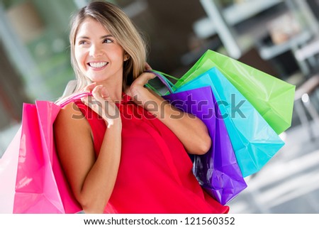 Pensive female shopper at the shopping center