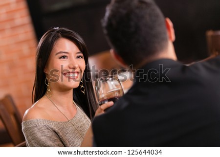 Couple enjoying dinner together at a restaurant