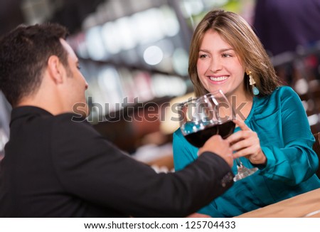Couple having a romantic dinner at the restaurant Couple having a romantic dinner at the restaurant