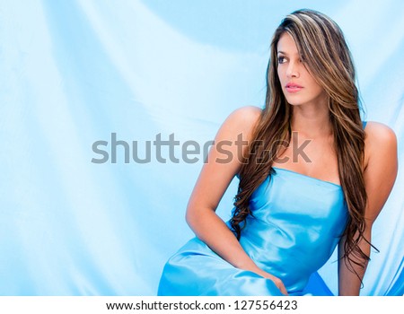 Woman in a beautiful aqua blue dress