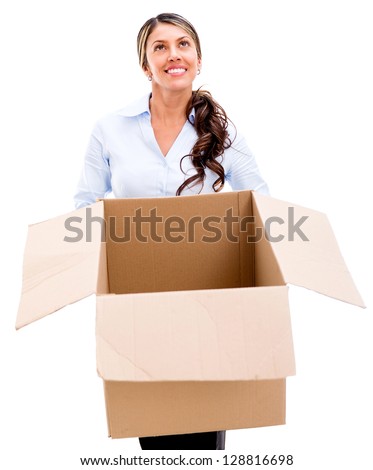 Business woman thinking outside the box - isolated over a white background