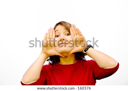 Casual Girl in red with open hands next to face