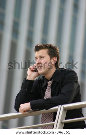business man receiving bad news on the phone