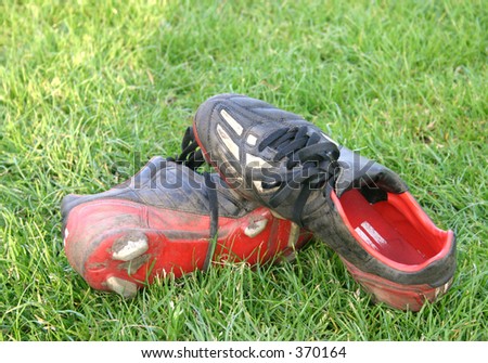 football boots on the floor after a football match