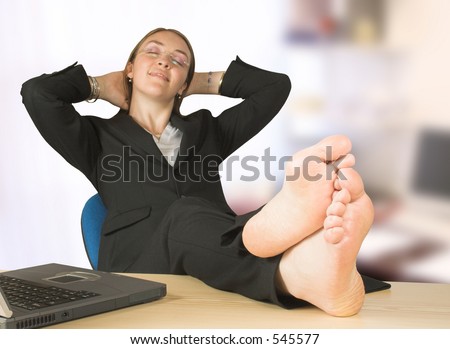business woman with her feet up at the office