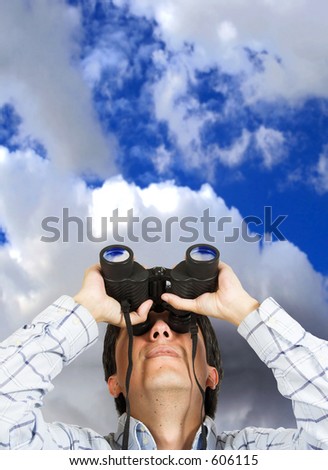business man searching for something with the sky at the background
