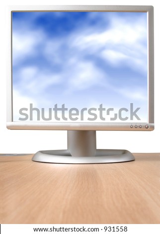 monitor on desk with a blue sky