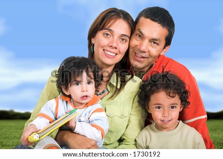 beautiful family outdoors - clipping path included to remove the background with ease