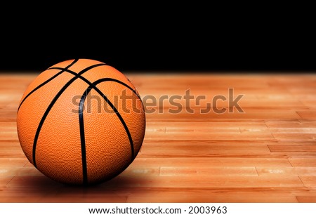 basketball ball on a court - wooden floor you can see the reflection of the ball on the wood - high resolution photo not a 3d render