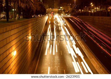moving traffic at night with moving lights