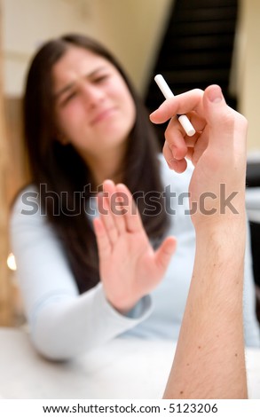 non smoking woman askying his partner to stop smoking