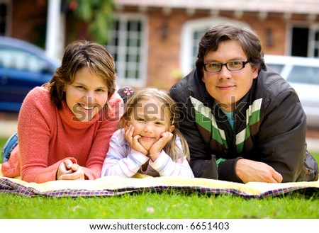 happy family at home outdoors - togetherness concept