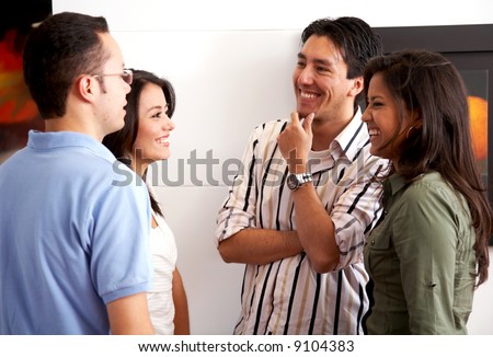 group of friends in an apartment talking