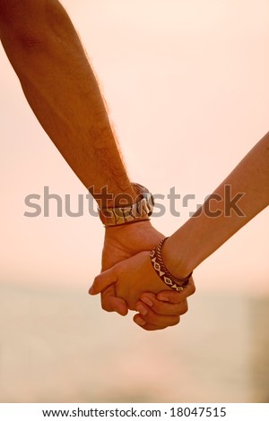 Holding Hands Romantic. holding hands at sunset in