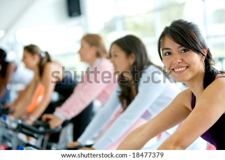 stock photos women. stock photo : women at the gym doing cardio exercises