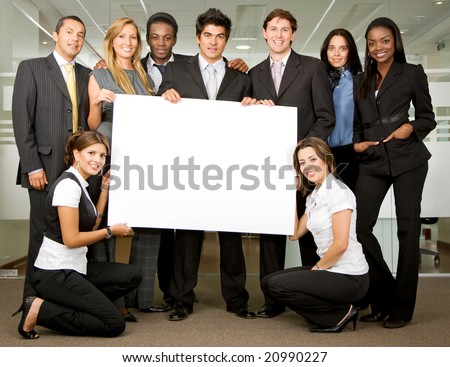 group of business people holding a banner add in an office