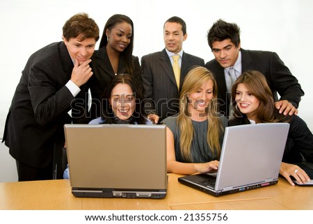 business group of people on laptops in a meeting at the office