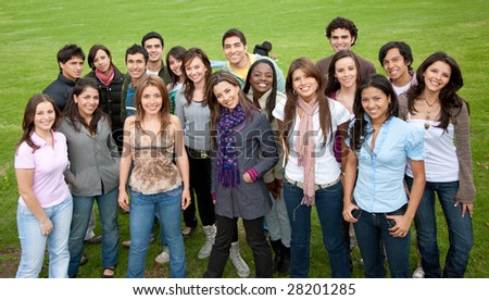 Large group of people smiling outdoors
