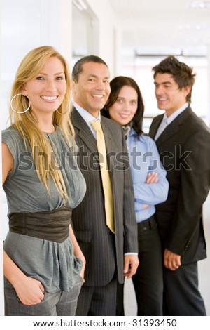 group of business people in an office lined up