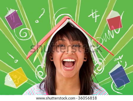 Excited student with a book on top of her head