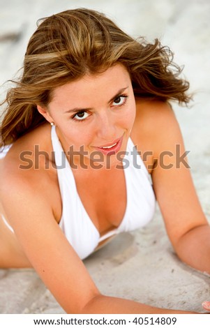 Bikini woman portrait smiling at the beach