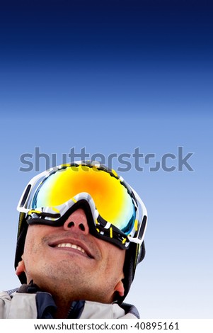 ski goggles clipart. stock photo : Man portrait with ski goggles outdoors and smiling