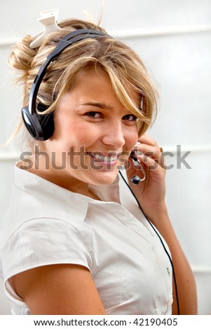 Young woman with a headset and smiling