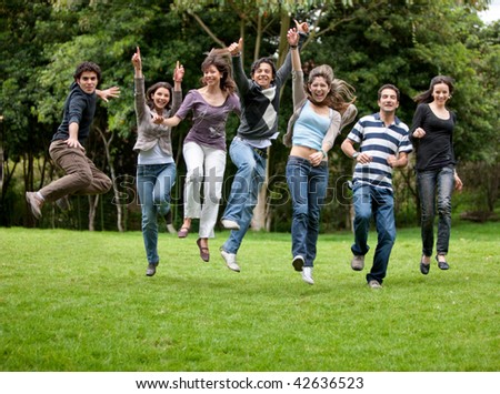 pictures of people having fun. stock photo : Group of happy people having fun outdoors