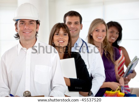 Group of happy people with different professions indoors