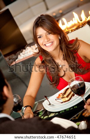 Beautiful woman on a date at a fancy restaurant