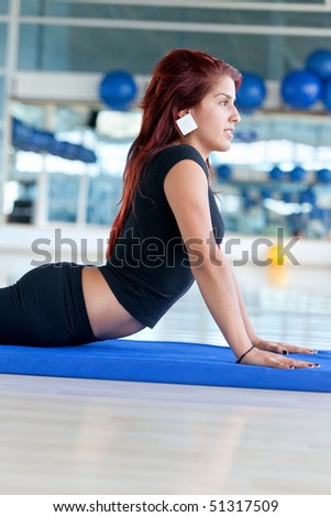 Group of woman in a  pilates class at the gym