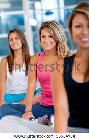 Group of women in a  pilates class at the gym