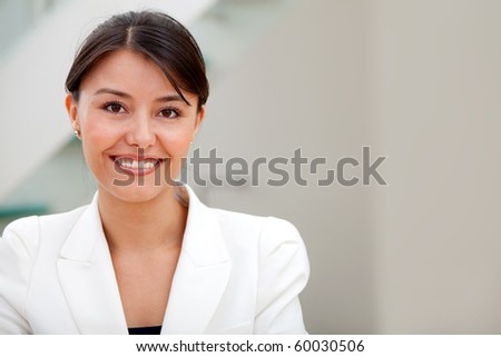 Beautiful business woman smiling at the office