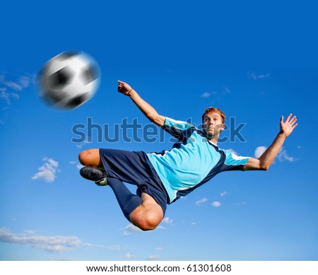 guy kicking football