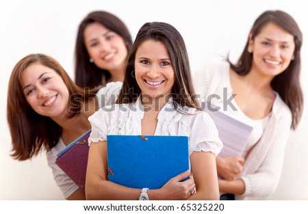Group of female students holding notebooks - isolated