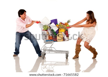 stock photo : Couple fighting over a shopping cart - isolated over white
