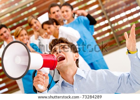 Patient screaming for help with a megaphone at the hospital