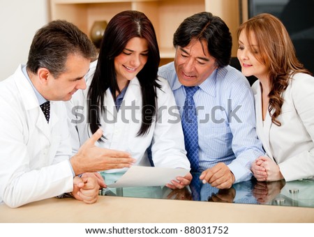 Group of business people in meeting with doctors offering medical insurance