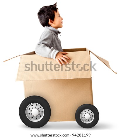 Boy in a car made of cardboard box - express delivery concepts