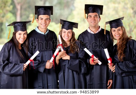 Happy group of students in their graduation smiling