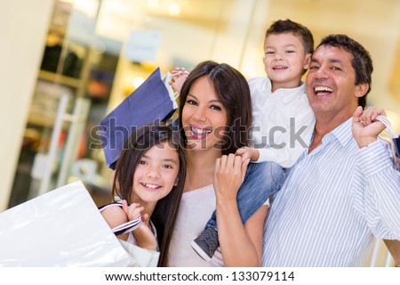 Family Going Shopping And Looking Very Happy