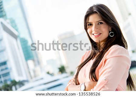 Beautiful casual woman looking very happy in Miami