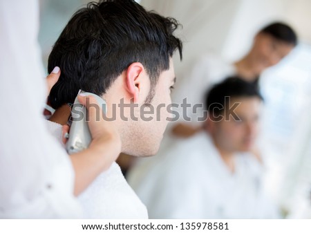 Man at the hairdresser getting a haircut