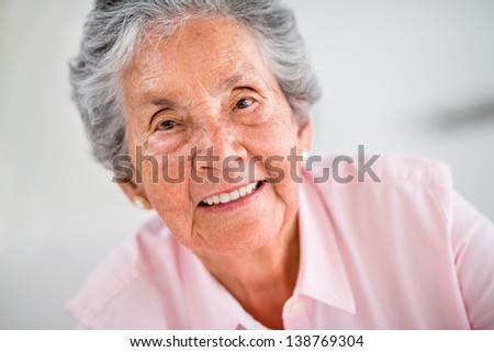 Portrait of a happy old woman smiling