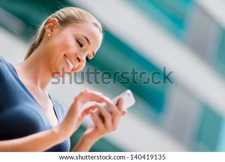 Business woman using app on a smart phone