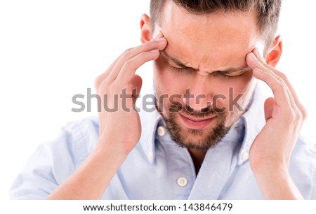 Frustrated business man with a headache - isolated over white