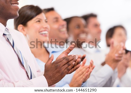 Happy Business Group Applauding At The Office