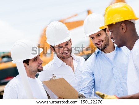 Group of engineers talking at a construction site